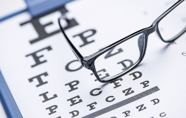Reading glasses with eye chart